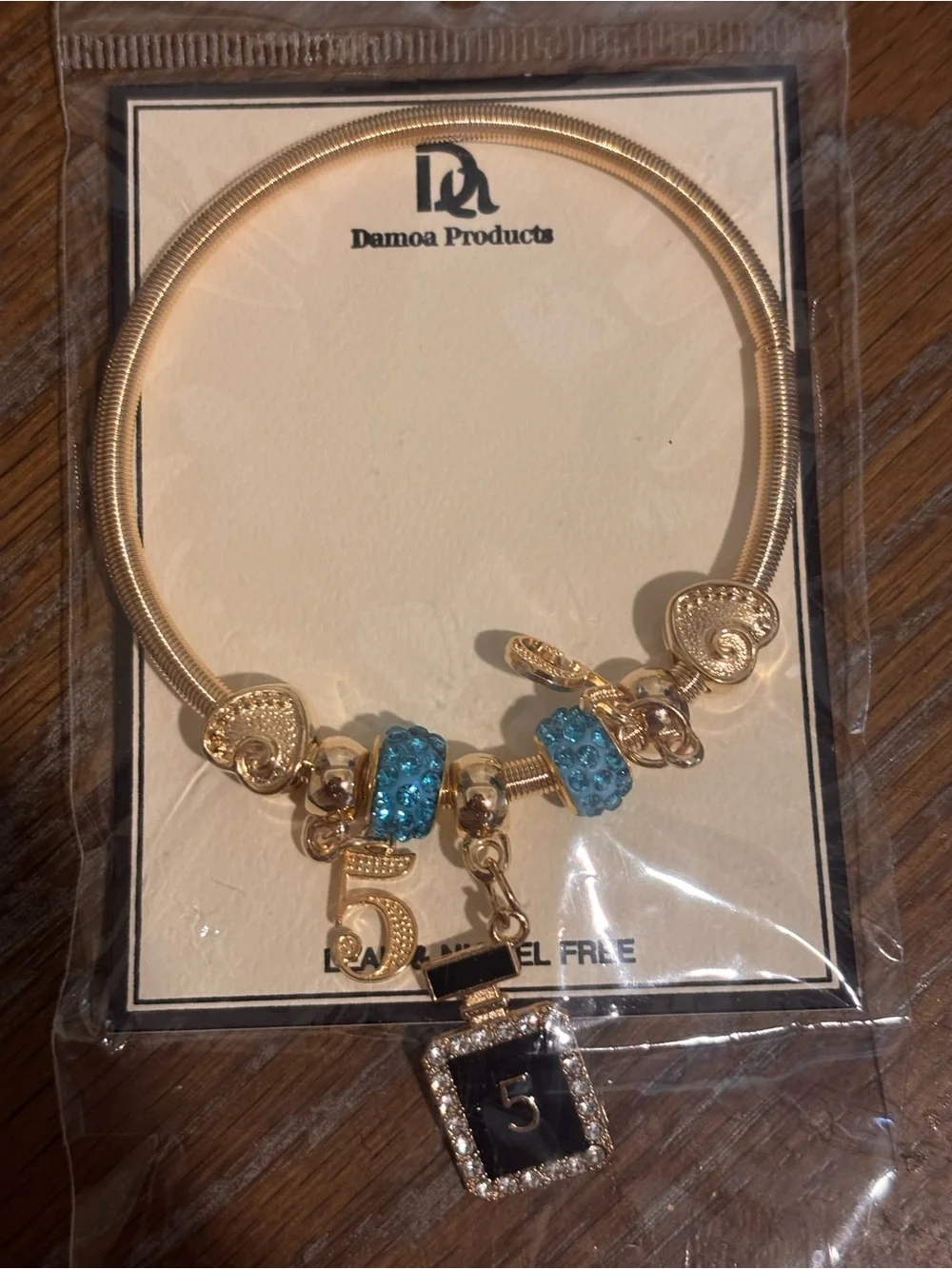 Gold-Tone Charm Bracelet with Blue Crystal Accents and Number 5 Pendant